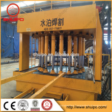 Tank head making machine for fuel tank